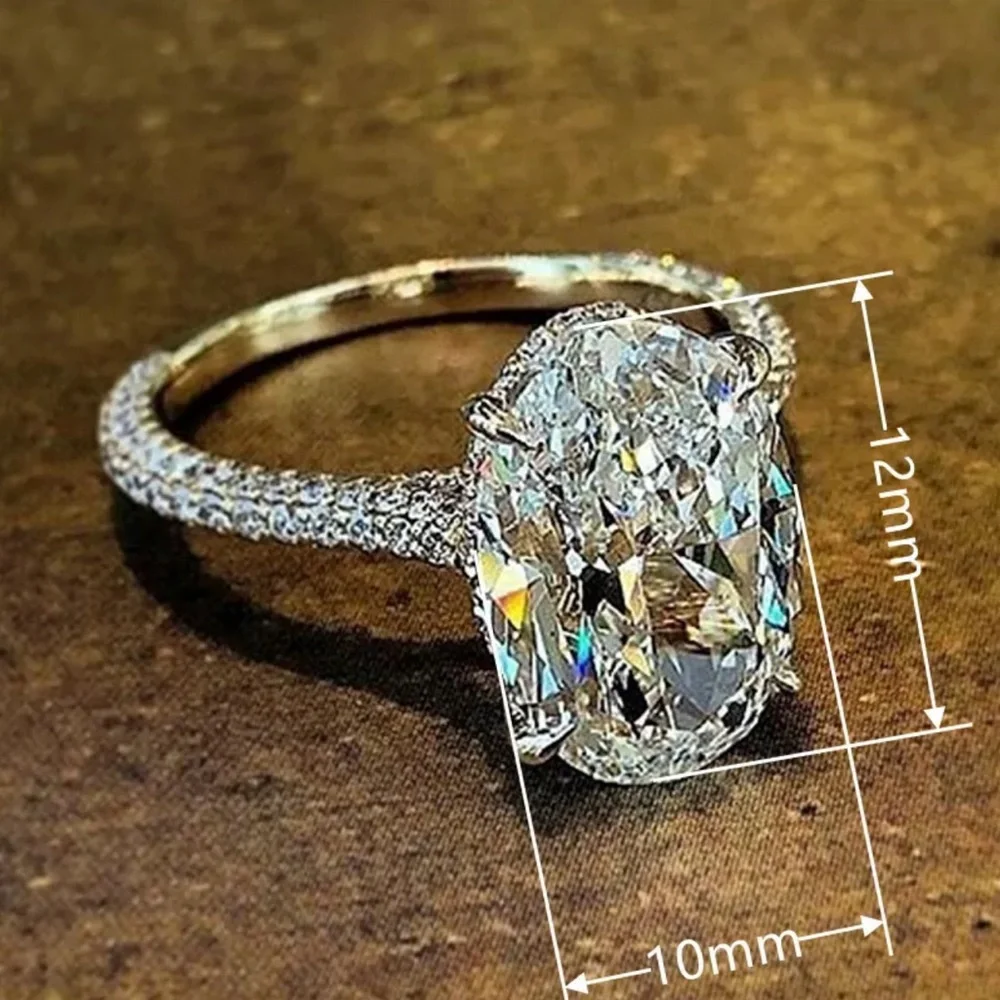 Huitan Gold Band Ring with Clear Oval Crystal